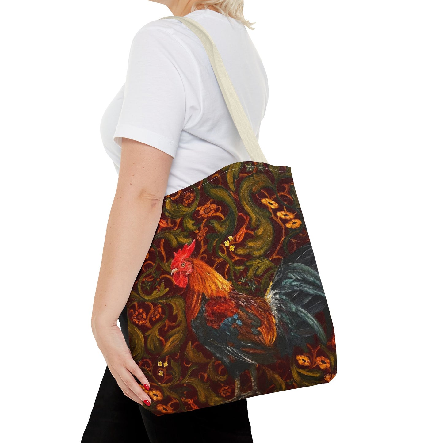 Person holding a bag with a rooster design on a white background