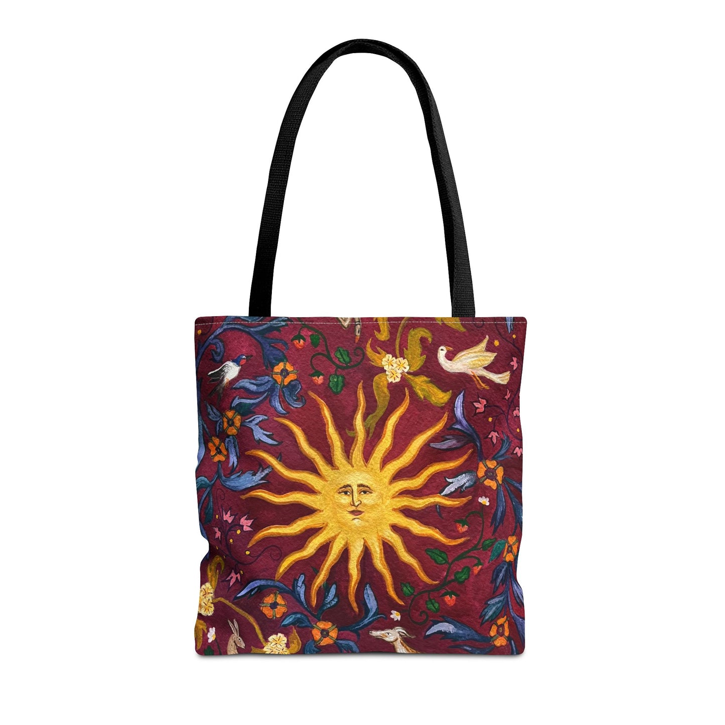 Tote bag with sun and floral design on a red background with black handles
